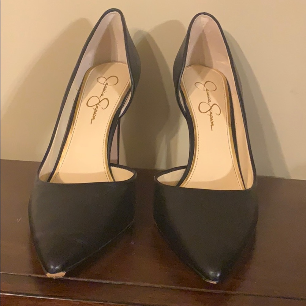 Black slightly worn office shoe